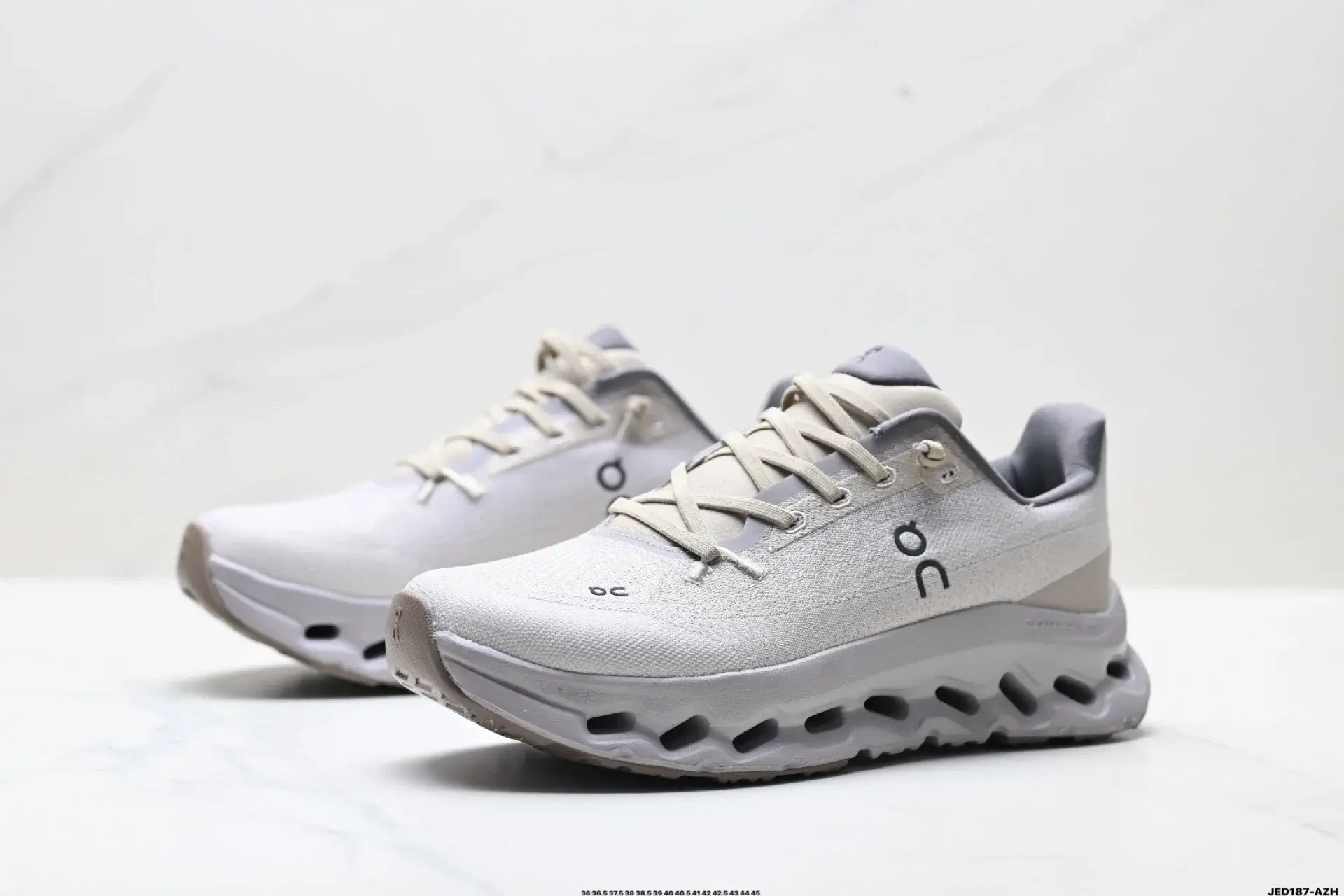 On Light Gray Running Shoes with Cloud Sole