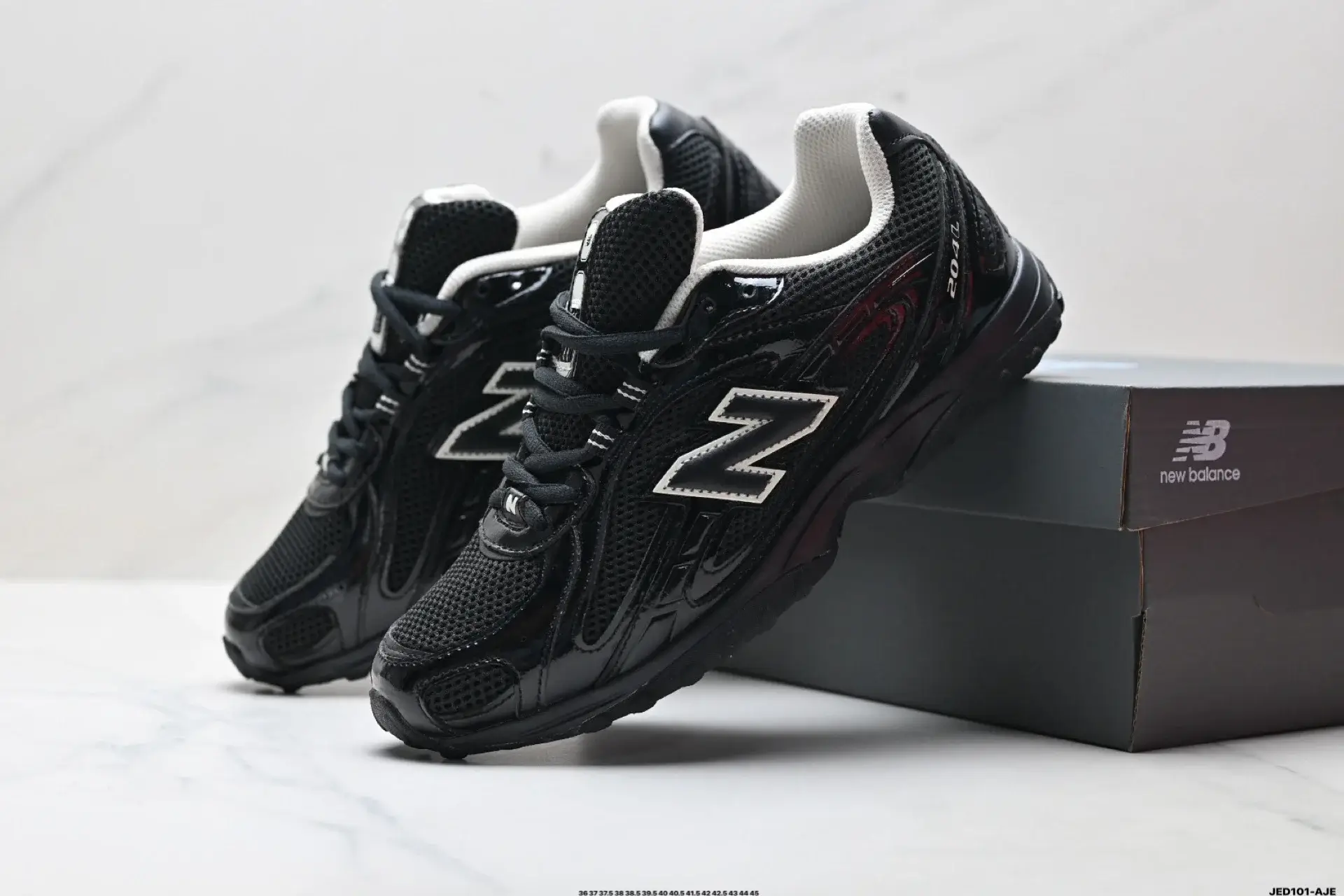 New Balance Black & White Mesh Sneakers
