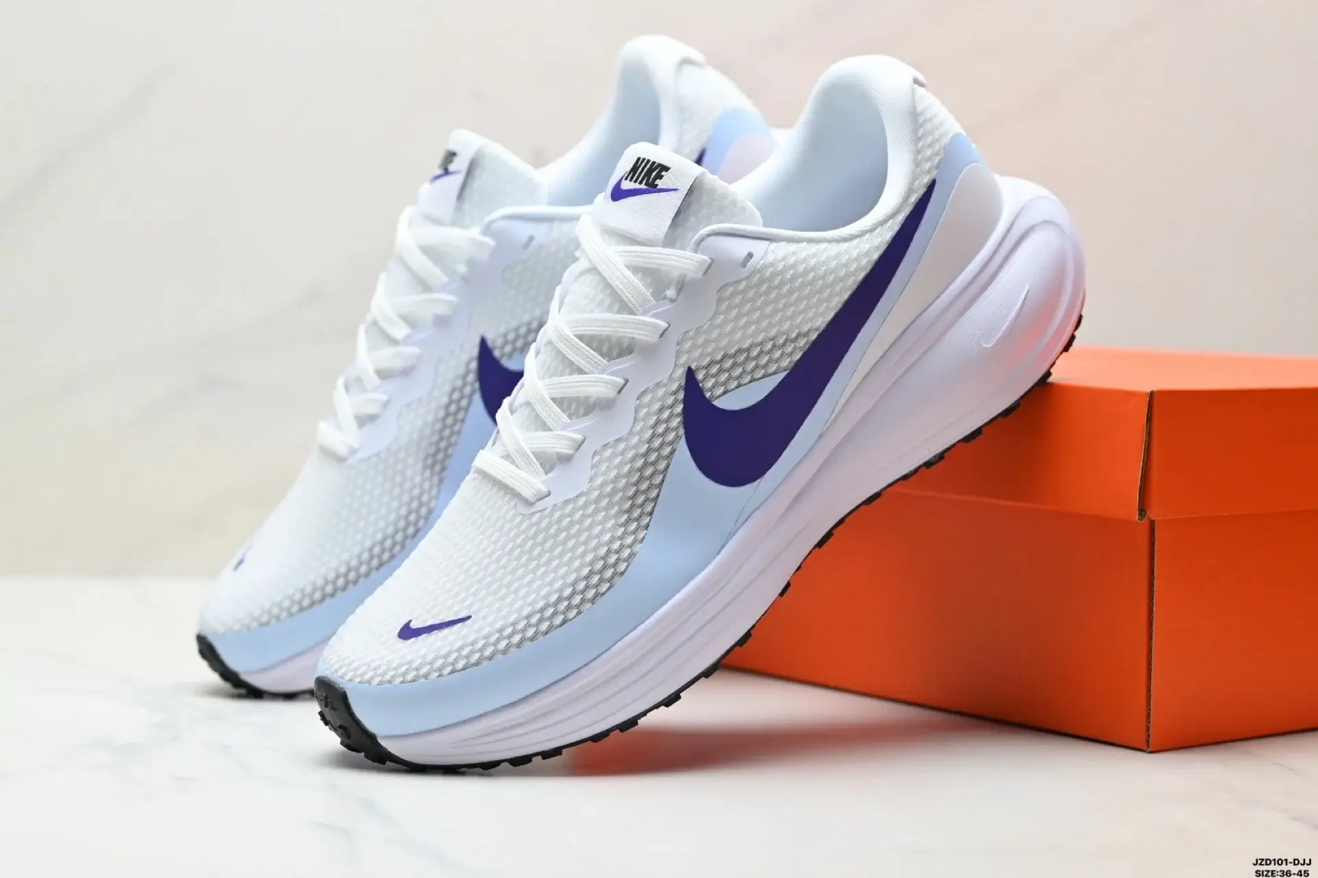 Nike Light Blue Running Shoes with Purple Swoosh