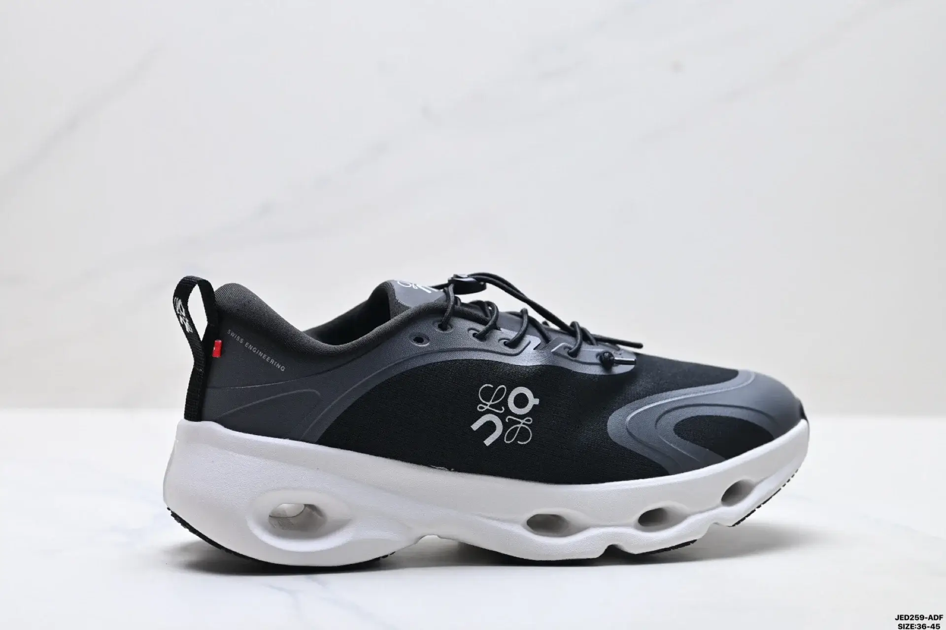 On Running Black & White Laced Sneakers