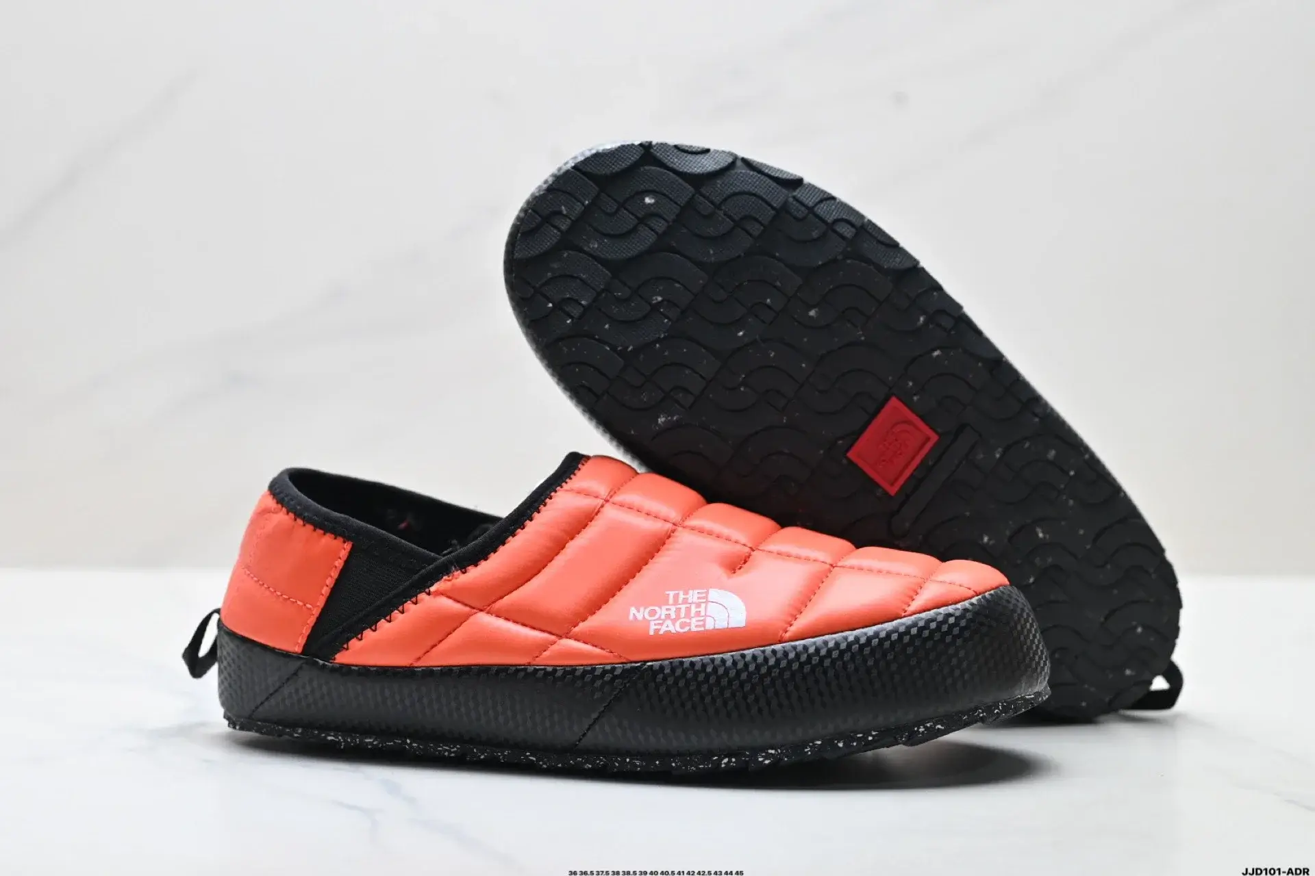 The North Face Orange Quilted Slip-On
