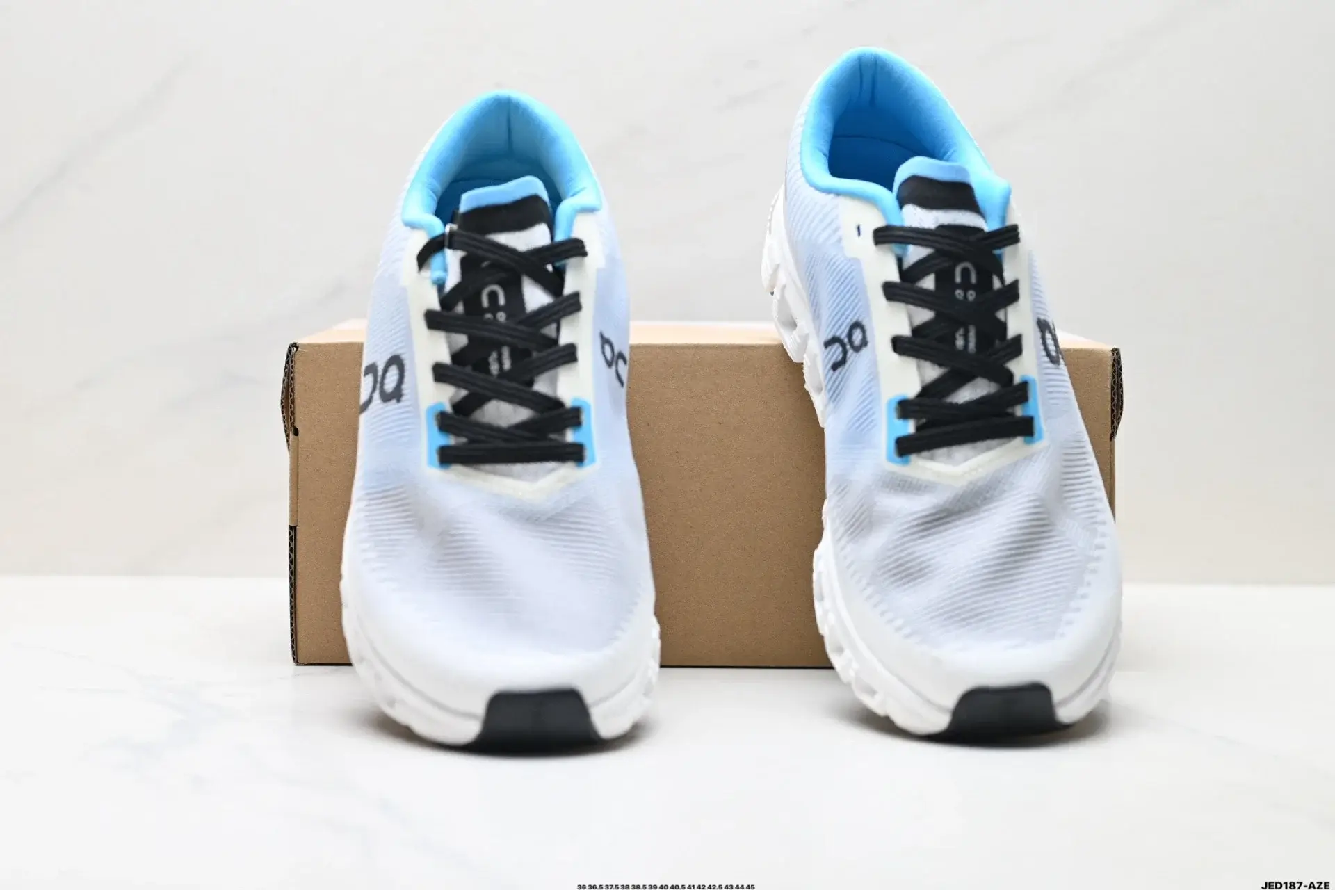 On White & Light Blue Running Shoes