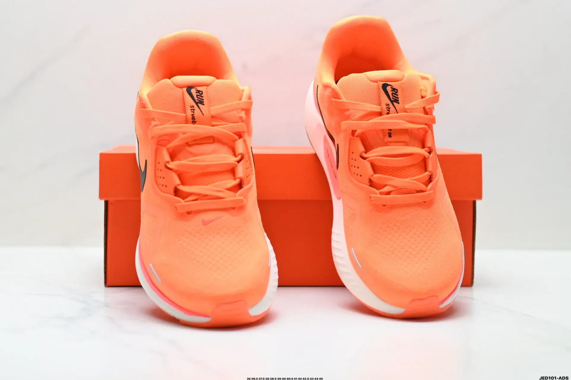 Nike Orange Running Shoes: Breathable Mesh & Supportive Sole