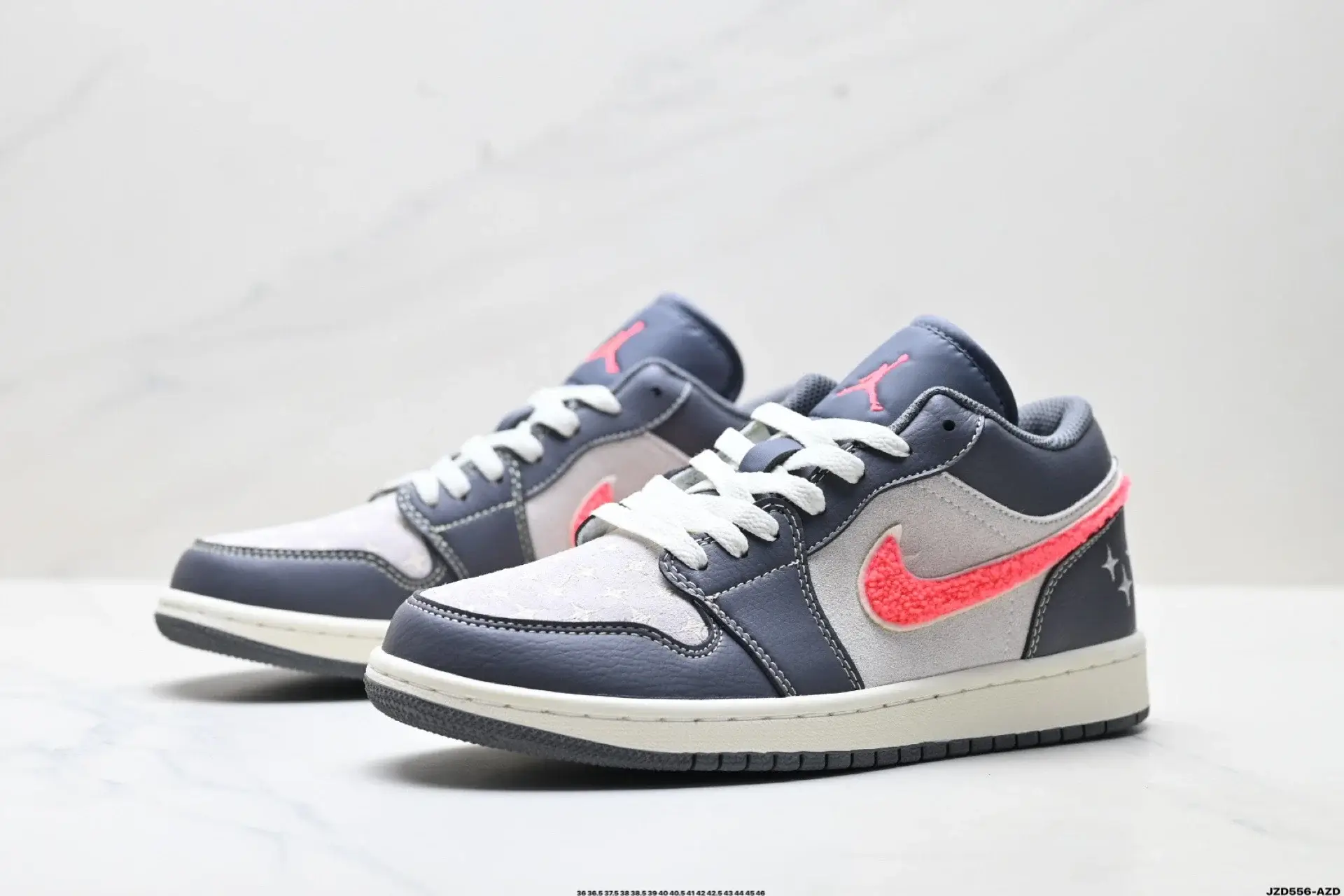 Jordan 1 Low Grey Pink Fuzzy Swoosh