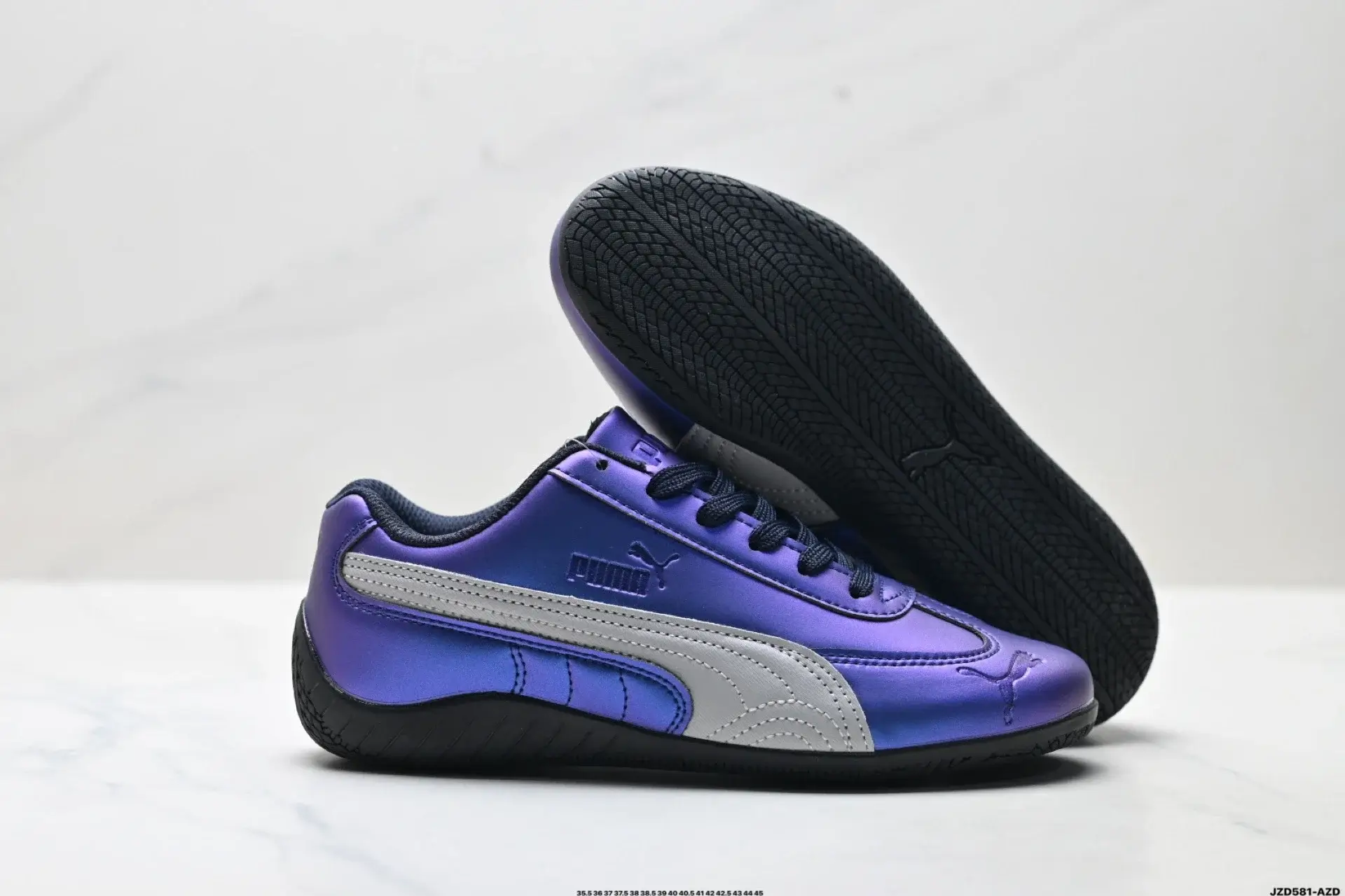 PUMA Purple Sneakers with Silver Stripes