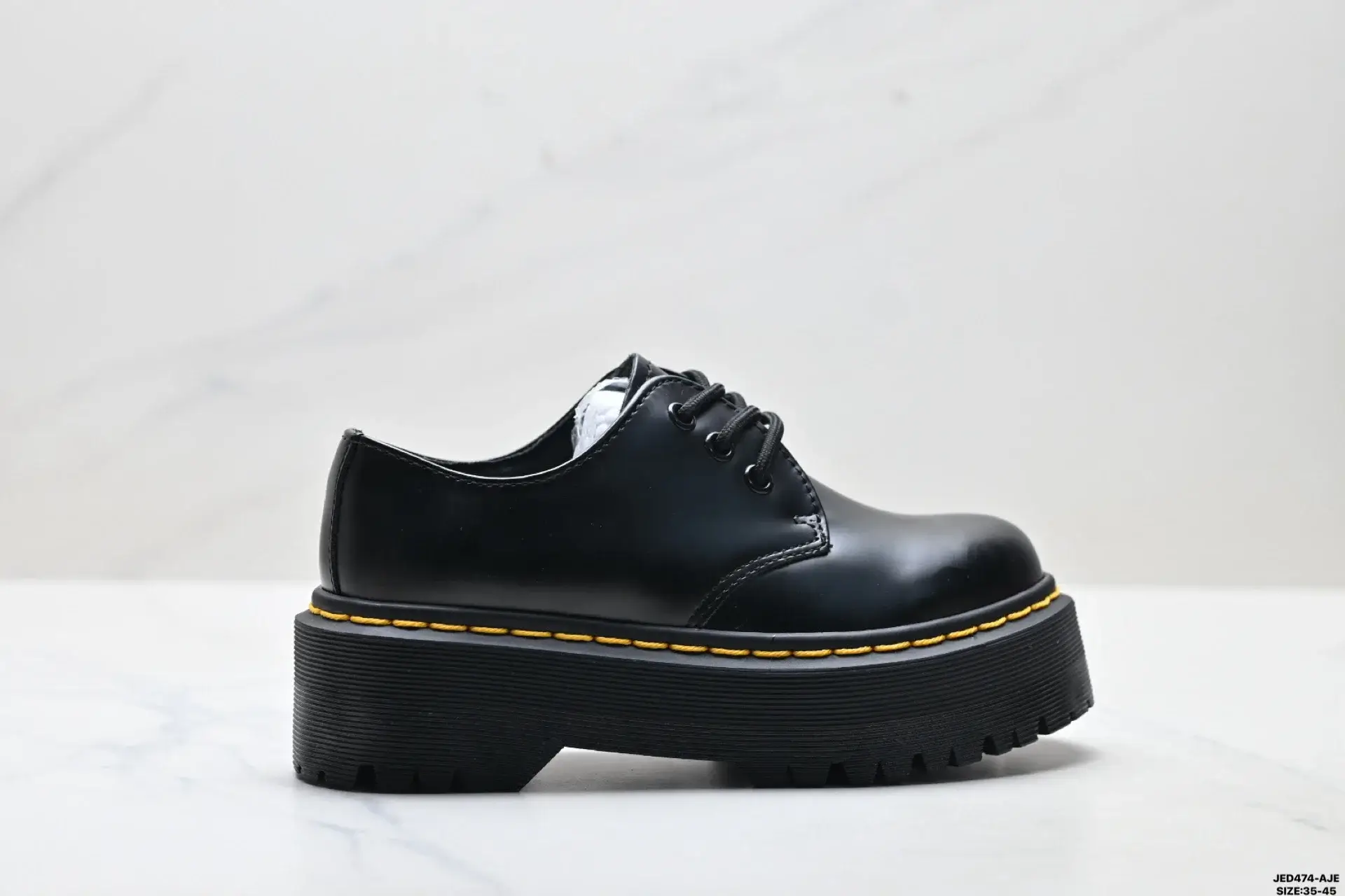 Dr. Martens Black Platform Lace-Up