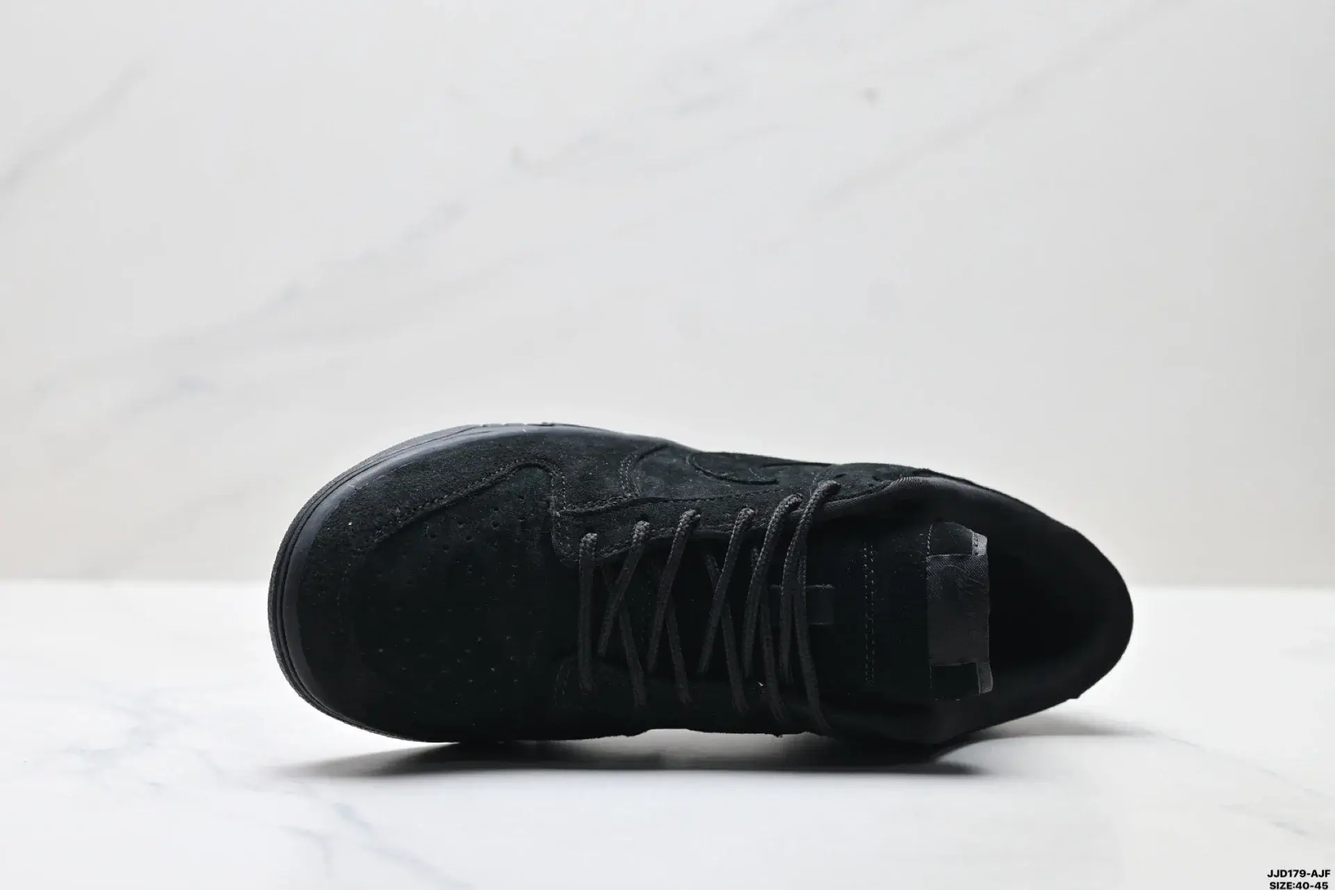 Nike Black Suede Low-Tops