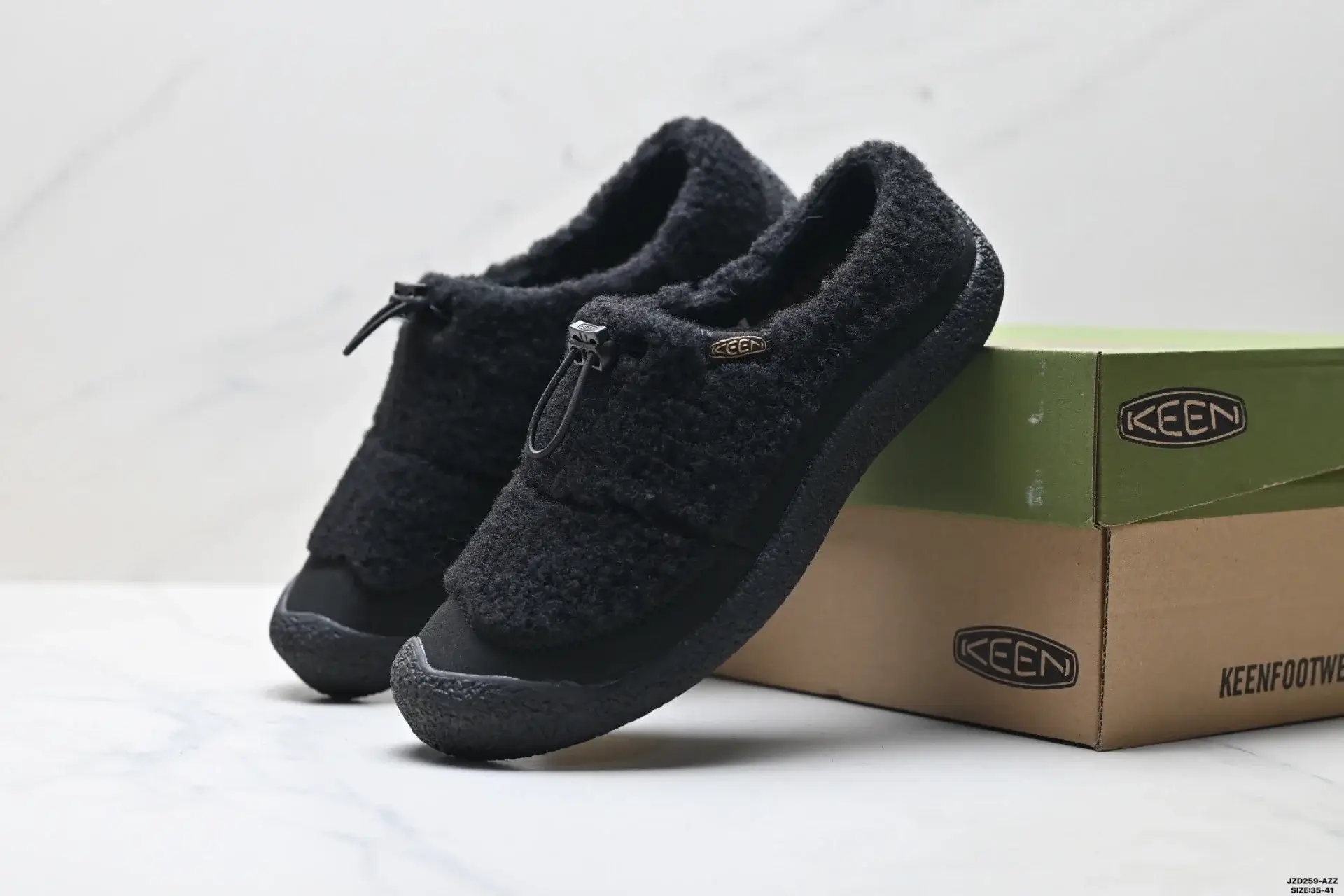 KEEN Black Fuzzy Slip-Ons