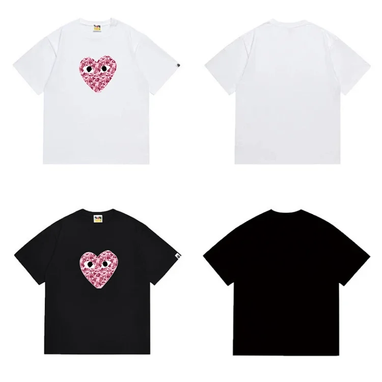 Comme des Garçons Play T-Shirts: Pink Heart Eyes