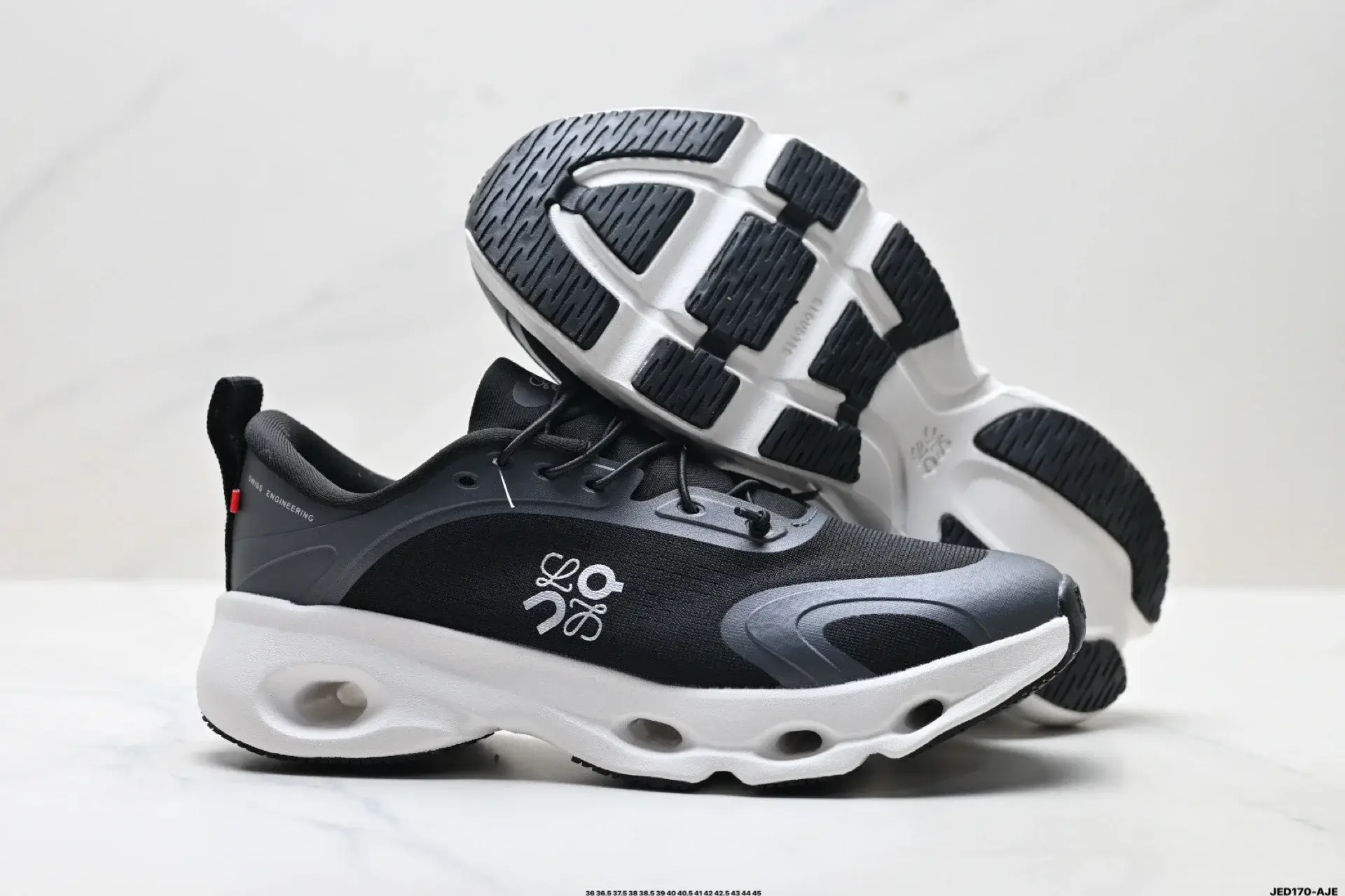 On Running Shoes: Black Upper, White Perforated Midsole