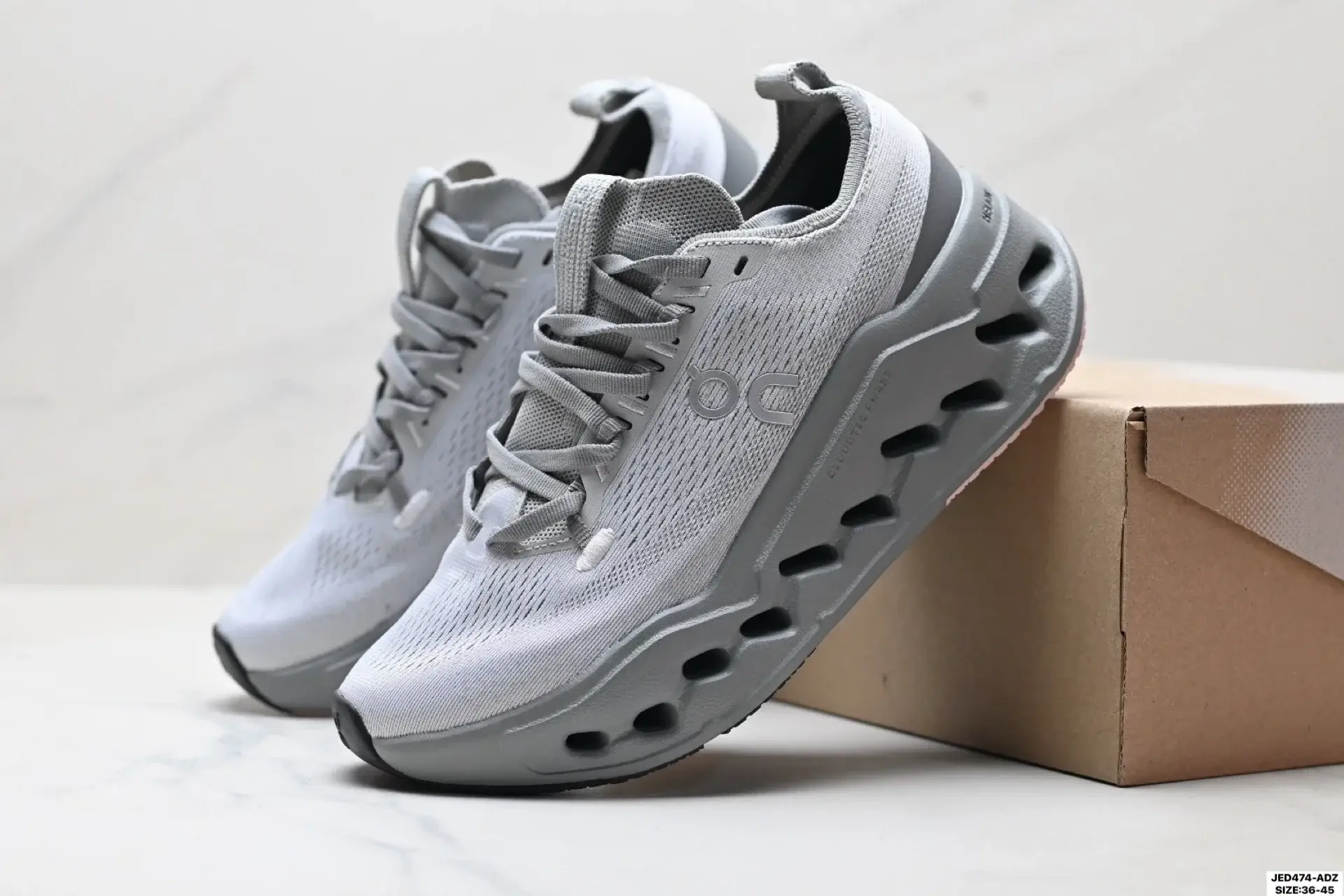 On Light Gray Running Shoes with Breathable Mesh & Perforated Sole